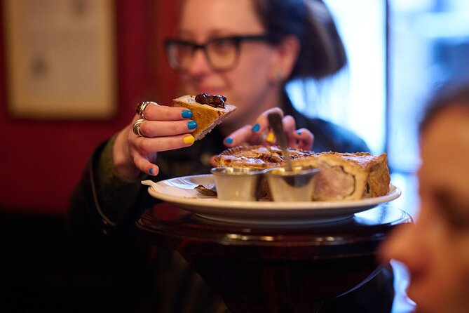 Devour London Historical Pub Tour:Traditional British Food & Ales - Stop 4: Ye Olde Cock Tavern by the Thames, scotch egg, portobello ale, and shuffleboard