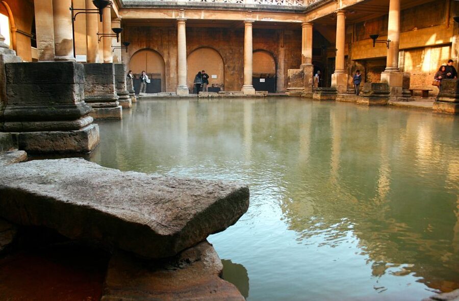 From London: Stonehenge and Bath Private Full-Day Trip - Bath city time: Roman Baths, natural hot springs, and Pump Room sip