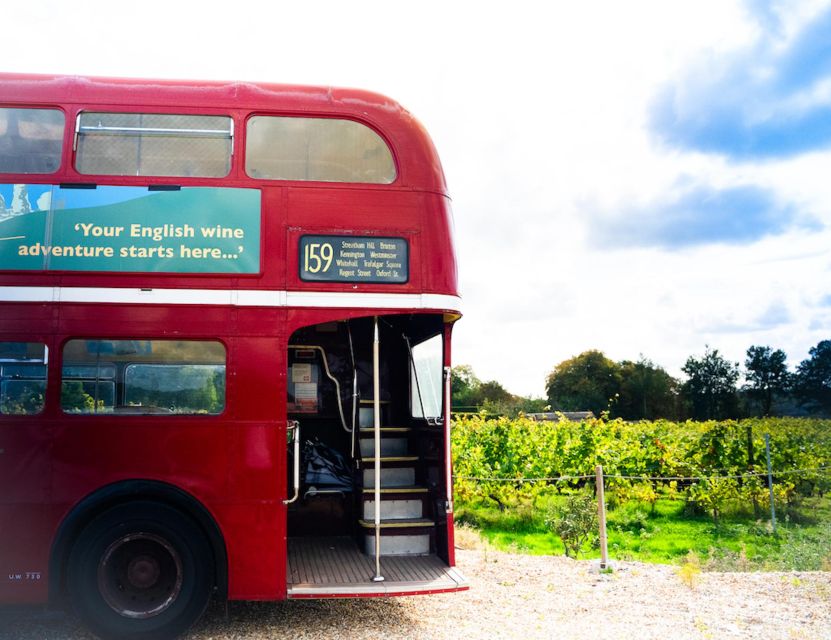 From London: Vintage Bus Wine Tour with Return Train Tickets - Vineyard Stop One: manager-led tour, tutored tastings, and lunch in the vines