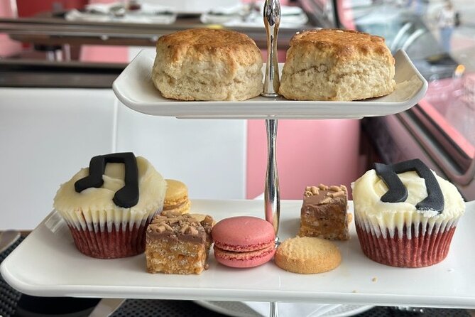 "Here We Go Again" London Afternoon Tea Bus - ABBA Tea Bus Overview: 90 Minutes, a Double-Decker, and a Sit-Down Meal
