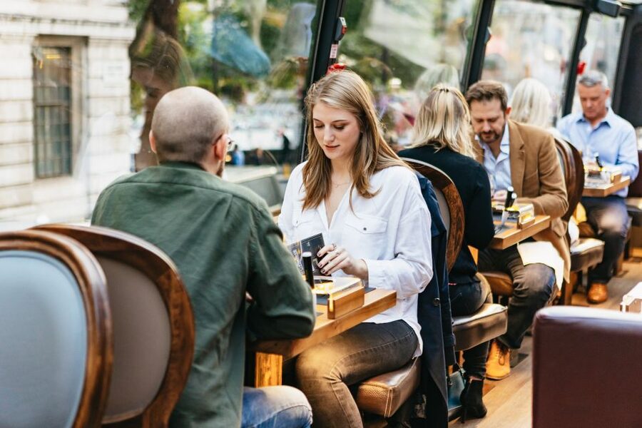London: 6-Course Gourmet Dinner on a Luxury Coach - The guide, app support, and how you follow the story