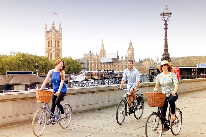 London Bike Tour: Landmarks, Secret Gems, Pub Stop & Street Art - Cleopatra’s Needle, London Eye, and a bike-lane view under Big Ben