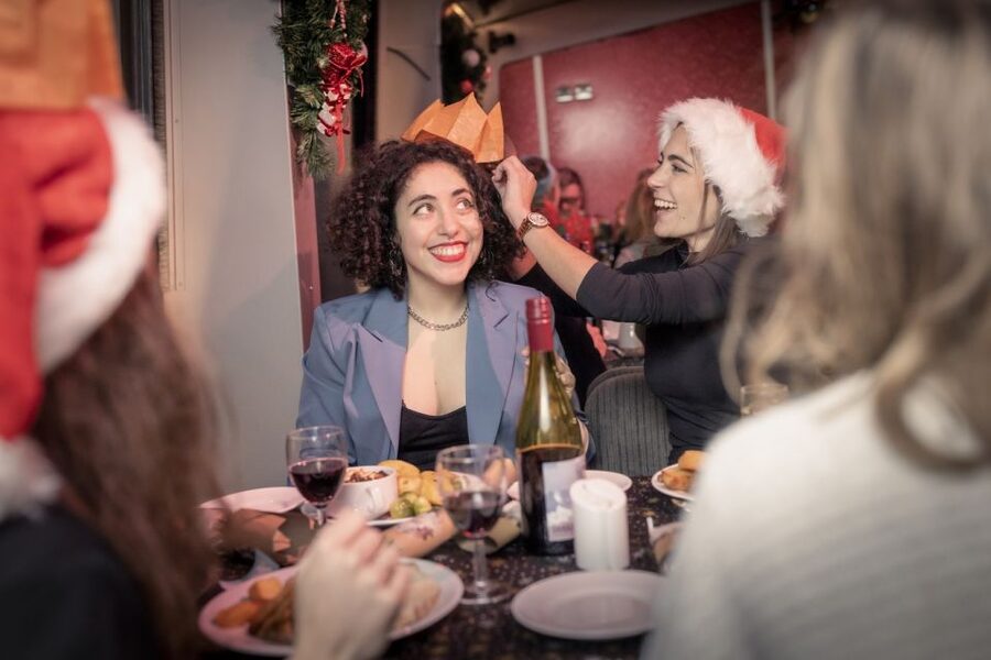 London: Christmas Party Dinner Cruise - Tables of 10 close together: festive energy versus personal space