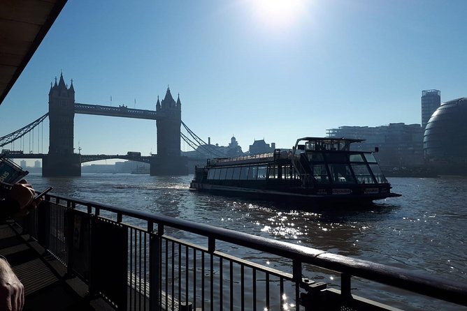 London Vintage Bus Tour with Cream Tea at Harrods - Thames River Cruise: London Bridge, the London Eye, and a Relaxing Change of Pace