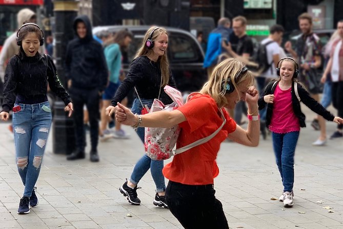 London West End Musical Silent Disco Walking Tour Top 1% Rated - Leicester Square, Piccadilly Circus, and Soho: where the singalongs get loud, in a good way