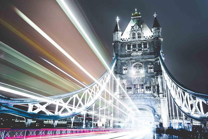 Private Night Photography Tour in London - London Eye after dark, capturing light strikes and creative night effects