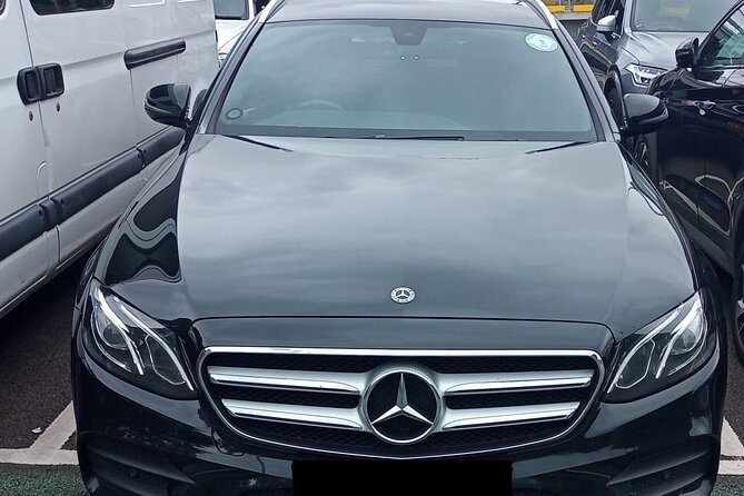 Round Trip Taxi Transfer - Luton Airport To & From London - Airport pickup in the arrivals hall (and how to find it fast)