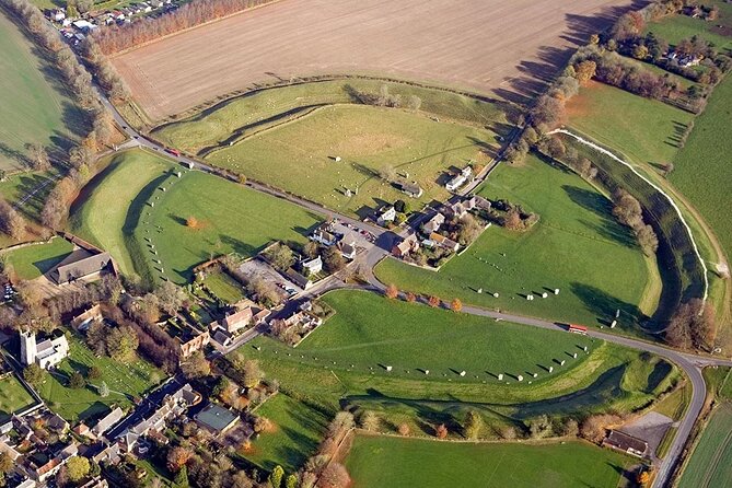 Stonehenge and The Stone Circles of Avebury Day Trip from London - Guide and driver teamwork on the road to prehistoric Wiltshire