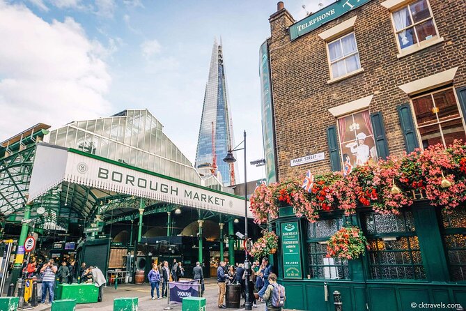 Walking Tour and Tasting at Indian Restaurant in London - The big landmark passes: Globe, Tate Modern, a 1000-year tower, and a warship museum